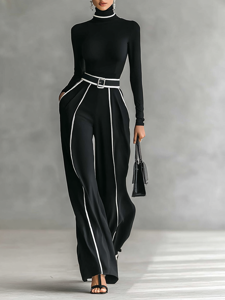 Tweedelig pak met coltrui en wijde broek met riem