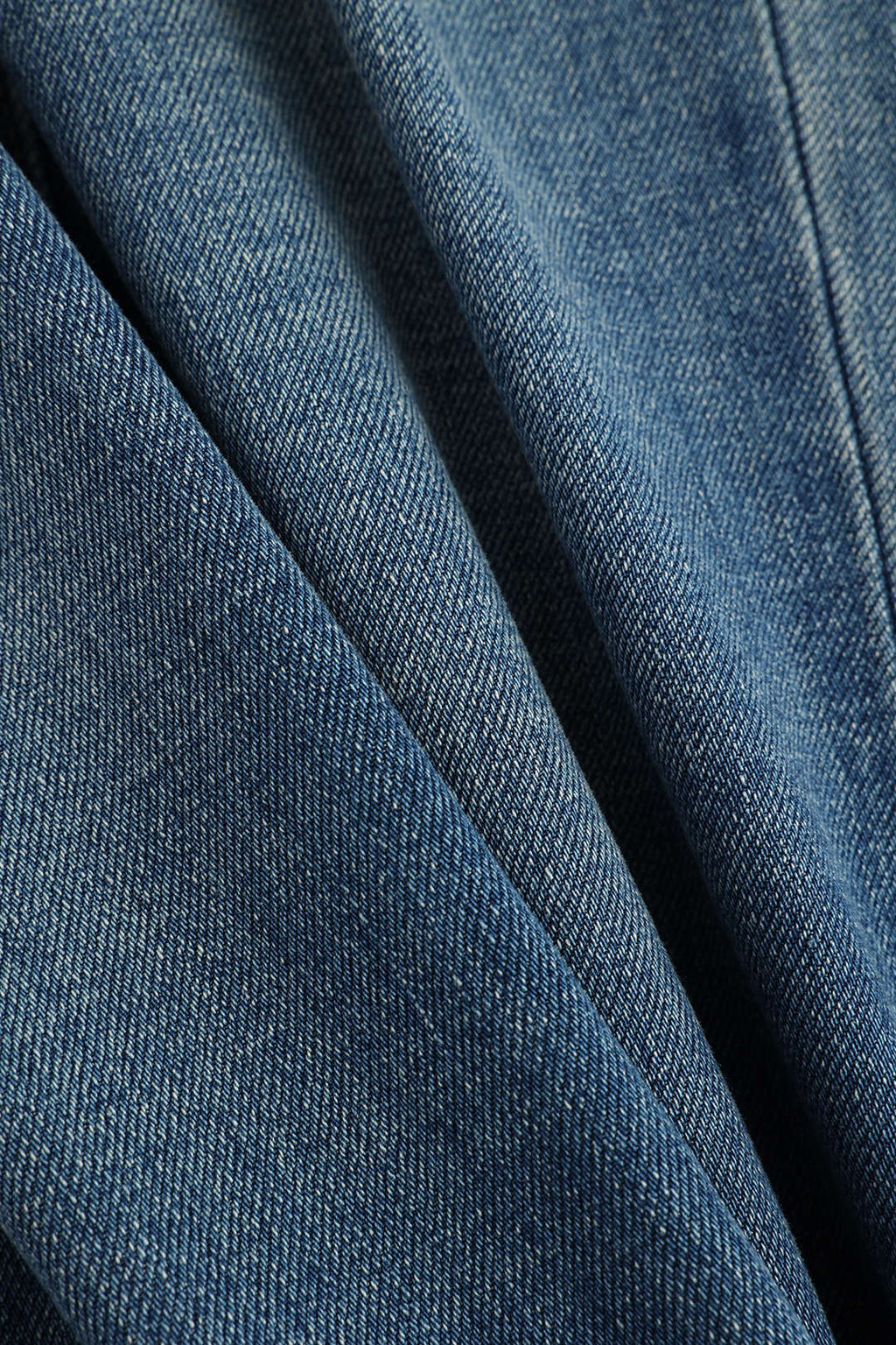 Jeans à taille haute et jambe évasée