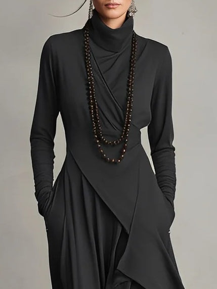 Asymmetrische lange jurk met opstaande kraag