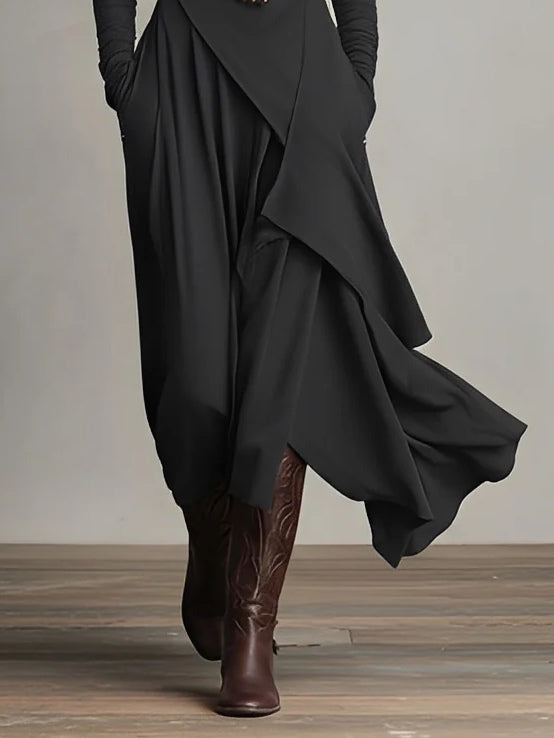 Asymmetrische lange jurk met opstaande kraag